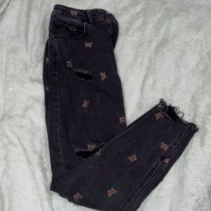 Black butterfly jeans